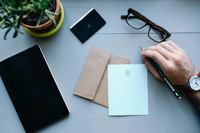 hand, man, watch, work, desk, workspace, people, business, male, person, businessman, letter, envelope, pen, writing, notebooks, business, business, letter, letter, letter, letter, letter, envelope, writing. Nine B2B influencer marketing strategy mistakes to fix before briefing creators